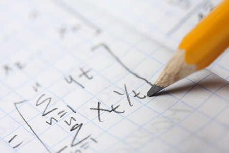 Math equation and a yellow pencil.