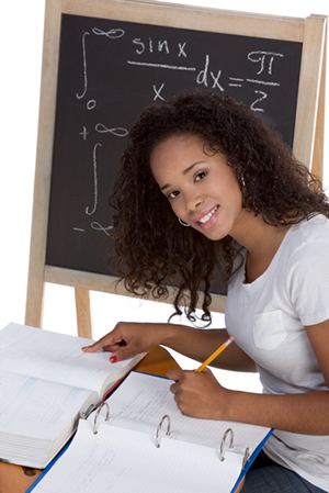 A female student sitting in a desk during math class.