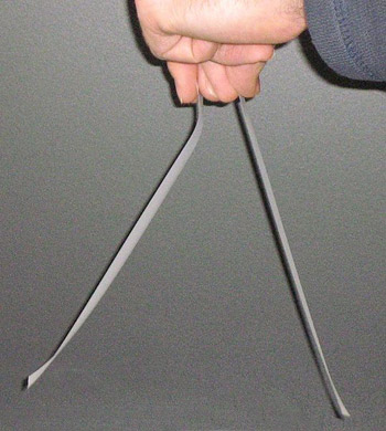 Two pieces of tape with opposite charge attract each other.