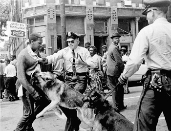 Dogs held by police attacking protestors in Alabama