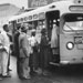 African Americans boarding through the front of a bus