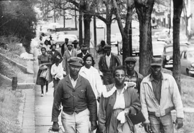 African Americans walking on a sidewalk during the boycott