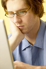 teenage student working at computer