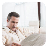 man reading newspaper