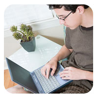 young man with laptop