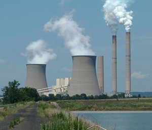 a coal-burning power plant producing air pollution