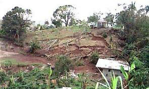 a house damaged by an earth flow