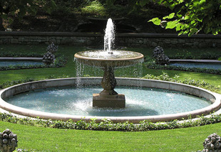 a fountain in a garden