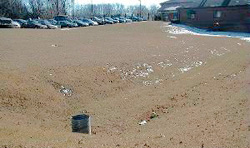 a basin area artificially created next to a street