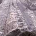a slab of rock with long grooves in it