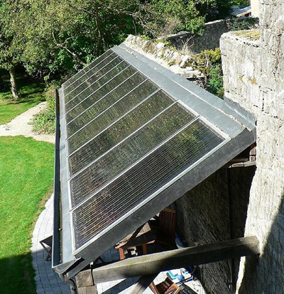 solar heating panels on a roof of a house