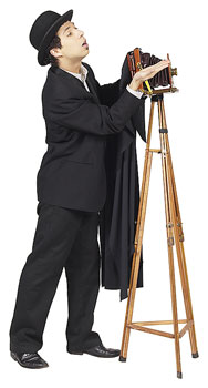 Photographer with a camera on a tripod