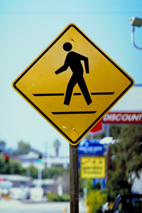 Pedestrians crossing sign