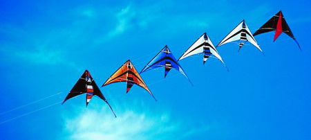 lots of colorful kites in the air