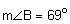 the measure of angle B equals 69 degrees