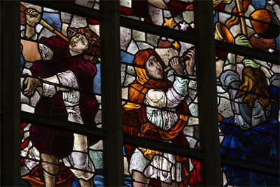 Stained glass windows depicting Medieval era musicians