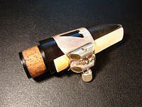 Clarinet mouthpiece with reed