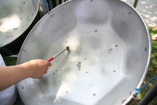 person playing a steel drum