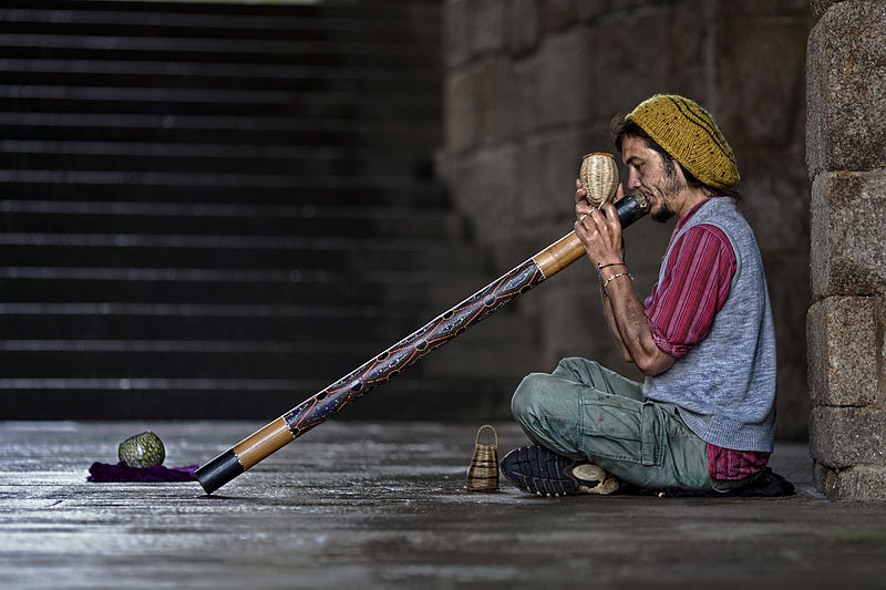 Street player playing a didgeridoo