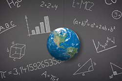 Math concepts written on a chalkboard with the Earth in the center; ThinkStock.com