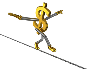 A dollar sign walking a tight rope; Shutterstock.com