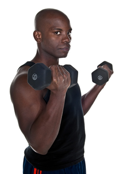 A young body builder working out with hand weights; Shutterstock.com