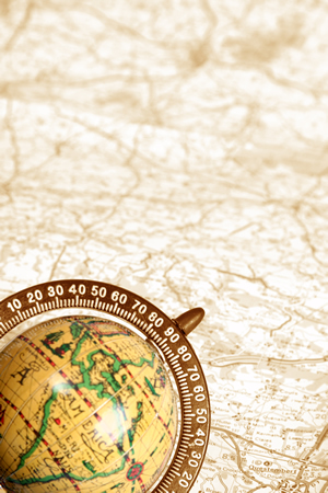 An old globe on map