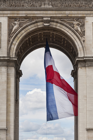 Arc de Triomphe detail showing French flag; ThinkStock.com