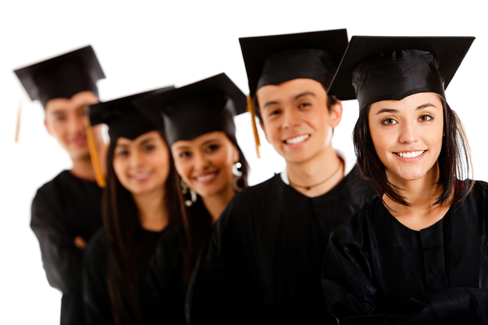 A group of five graduates against a white background