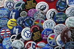 A collection of peace-sign buttons from the 1960's
