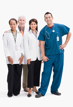 Four health professionals smiling